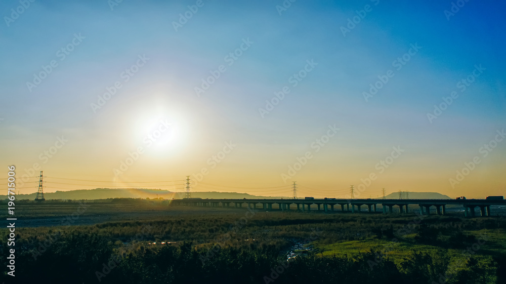 Scenery of the riverside park by River with a pathway Scenery of the riverside park by River with a pathway