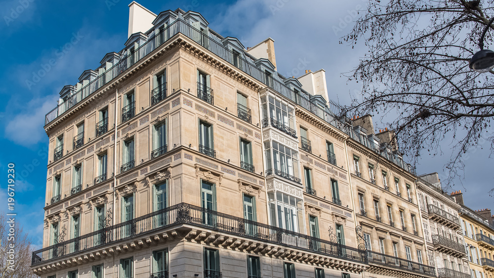 Paris, beautiful building in the center, typical parisian facade, place de la Madeleine 
