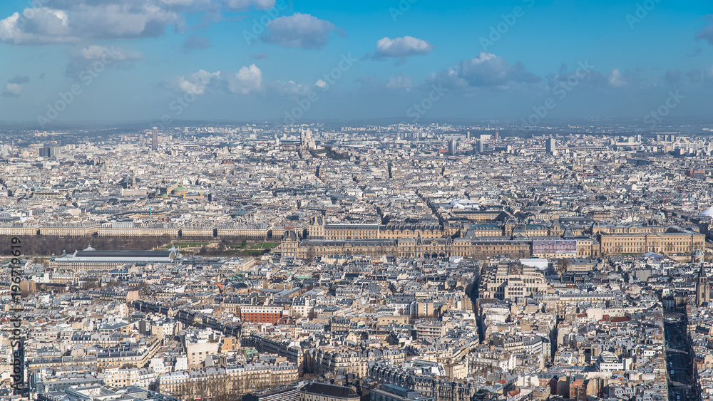 Paris, panorama, aerial view, the Louvre museum and Tuileries garden, and Sacre-Choeur church in background
