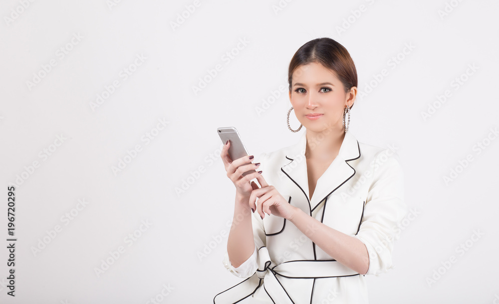 Beautiful young woman use of the cellphone Beautiful young woman use of the cellphone