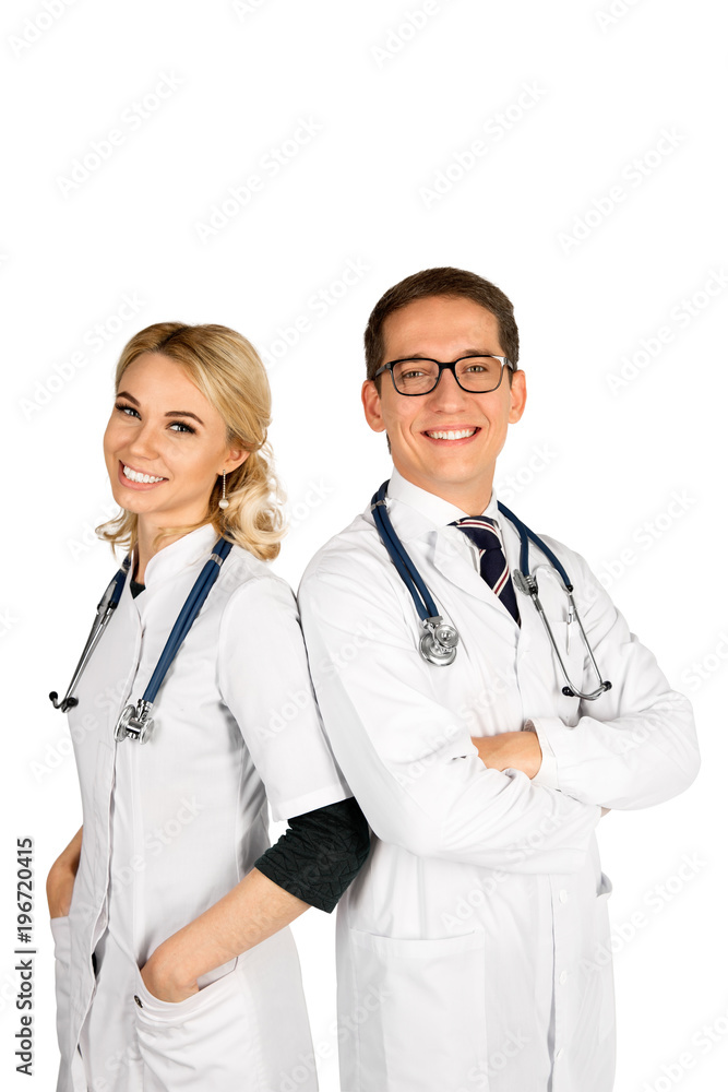 Portrait of two happy smiling young medical people, isolated over white background. Doctors Portrait of two happy smiling young medical people, isolated over white background. Doctors