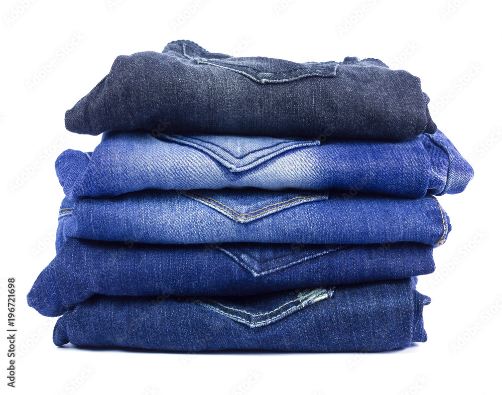jeans stacked isolated on white background. jeans stacked isolated on white background.