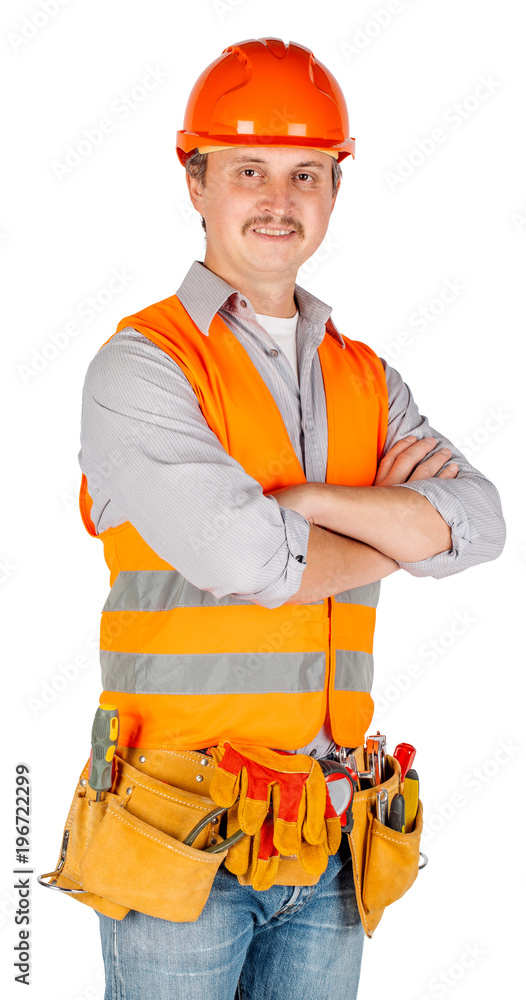 engineer in a helmet crossed arms and looking at camera engineer in a helmet crossed arms and looking at camera