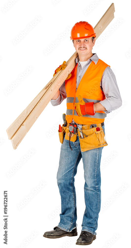 builder in a helmet holding wood boards