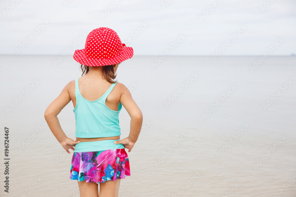 Portrait of little girl at the beach.