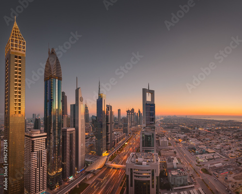 Dubai downtown skyline at beautiful golden sunset