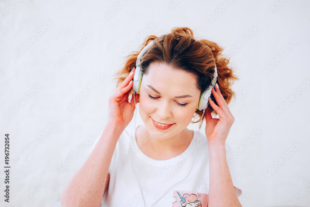 Relaxed lifestyle. Happy young woman spending time in bed. Relaxed lifestyle. Happy young woman spending time in bed.