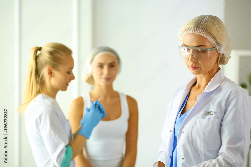 woman getting injection. beauty injections and cosmetology woman getting injection. beauty injections and cosmetology