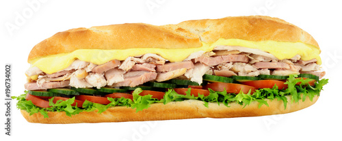 Chicken and ham sandwich with fresh salad in a crusty baguette isolated on a white background