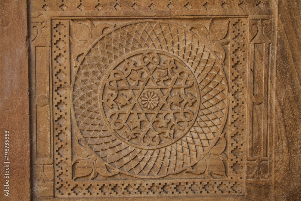 Stone carving in Indian style - geometric shapes, circle inside the square Stone carving in Indian style - geometric shapes, circle inside the square