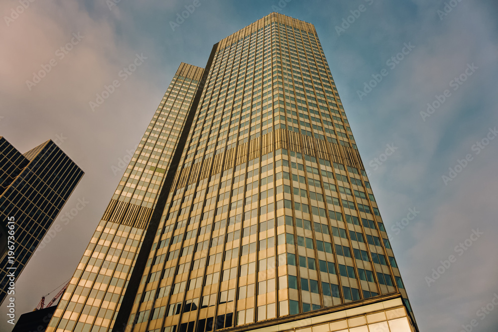 A skyscraper in a big city in Germany,shot from a public place