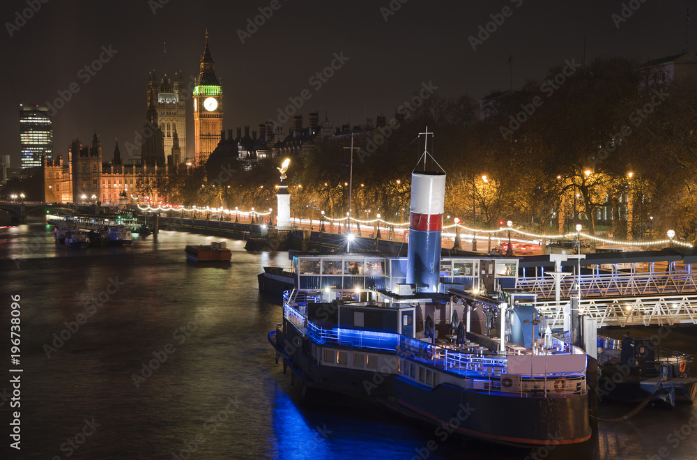 Fototapeta premium Beautiful landscape image of the London skyline at night looking along the River Thames