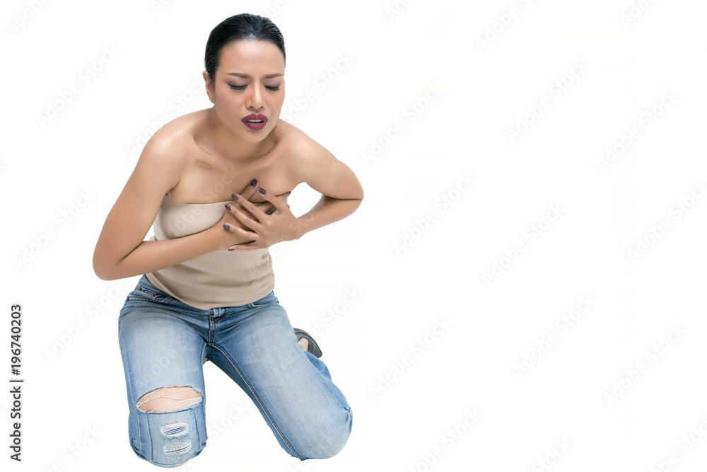 Beautiful middle-aged Asian woman' s hands pressing on her breast , feeling chest pain isolated on white background Beautiful middle-aged Asian woman' s hands pressing on her breast , feeling chest pain isolated on white background