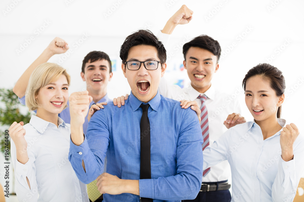 happy successful multiethnic business team