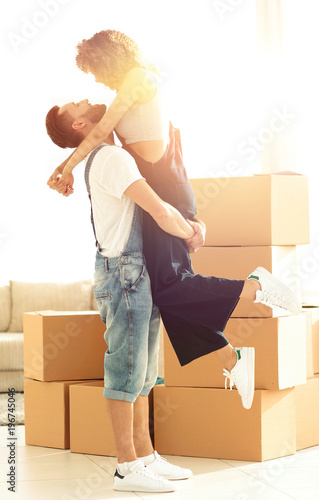 Portrait of a happy couple moving to a new house © ASDF