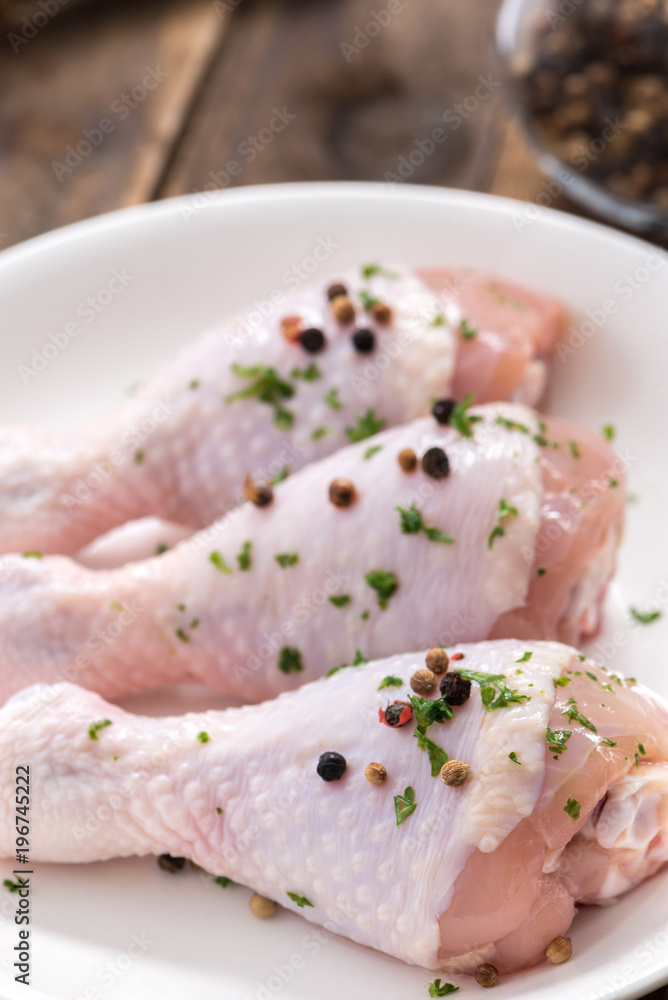 drumstick chicken on white plate
drumstick chicken on white plate