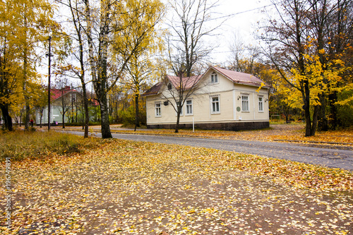 Autumn rural landscape in Finland with old wooden house.