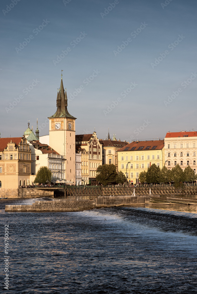 Sights Of Prague. Chapel and waterfront European city. Facades of vintage buildings