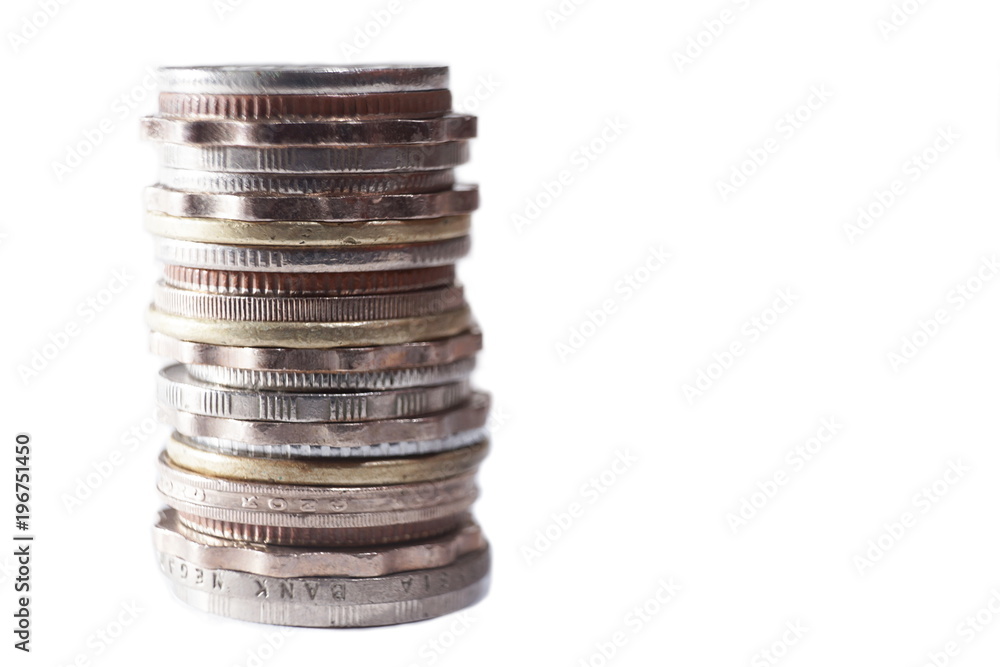 Different coins stacks with white background Different coins stacks with white background