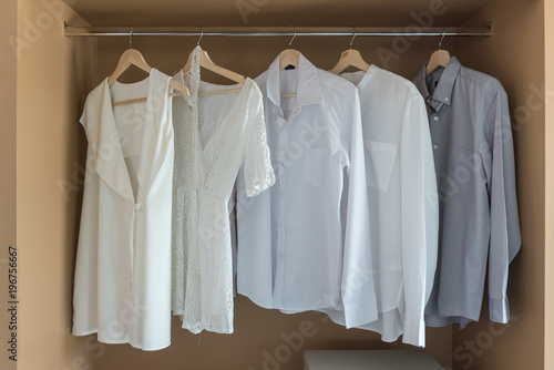 Wallpaper Mural white color shirts hanging on rail Torontodigital.ca