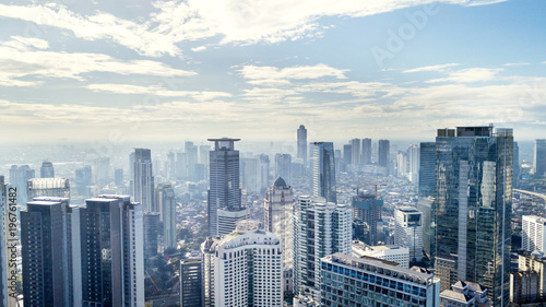 Jakarta skyline with modern office buildings and apartments at sunny day
