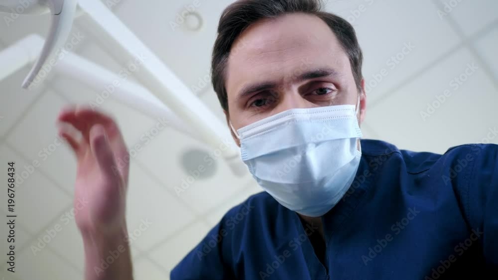 Man dentist working in private practice. Man dentist working in private practice.