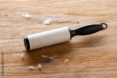 adhesive lint roller full of dust
