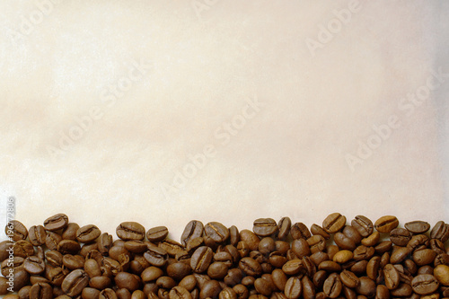 Obraz na płótnie Coffee beans on old burnt paper background w salonie