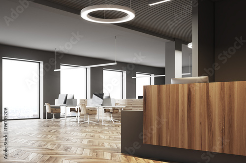 Dark and wooden office  reception open space side