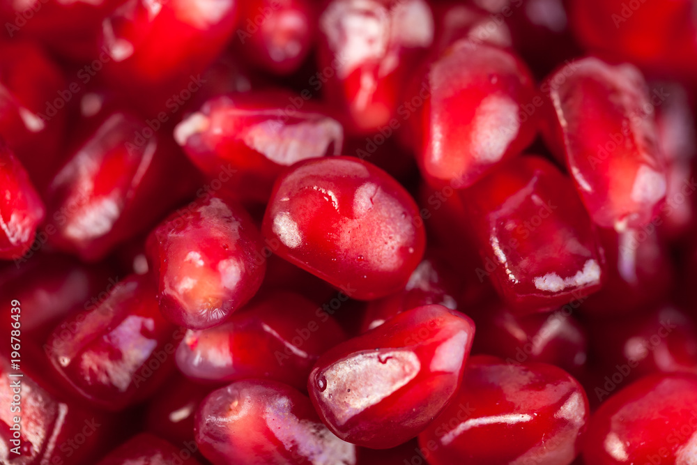 Close up of fresh organic pomegranate seeds, fruit Close up of fresh organic pomegranate seeds, fruit
