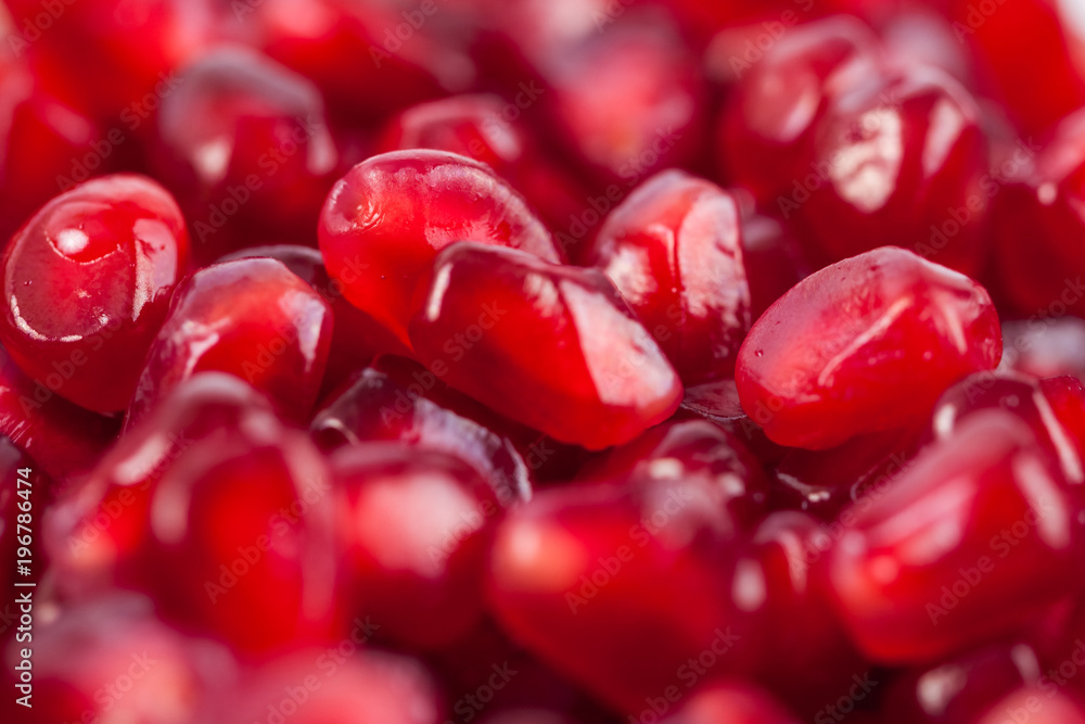 Close up of fresh organic pomegranate seeds, fruit Close up of fresh organic pomegranate seeds, fruit
