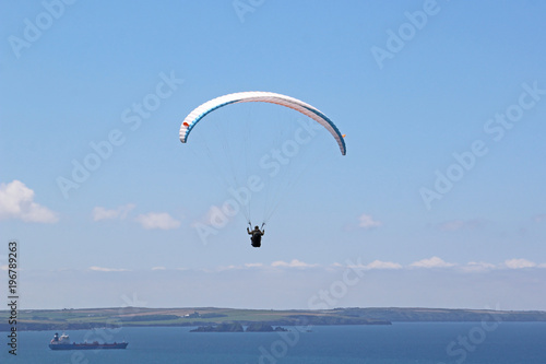 Paraglider flying above Newgale Bay