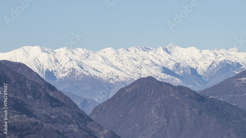 European alps full of snow in a blue sky © Luca Rossatti