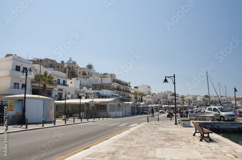 Street in the port with a view of the Naxos town at Naxos island in Greece