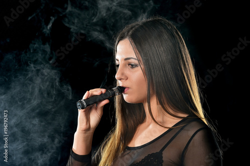 Young woman smoke E cigarette