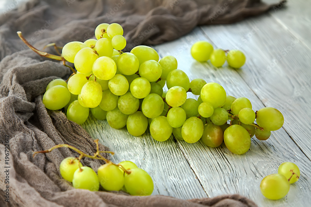 bunch green grapes on a grey wooden background bunch green grapes on a grey wooden background