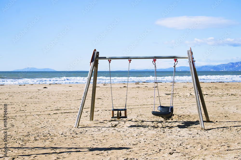background wooden swing on the beach background wooden swing on the beach