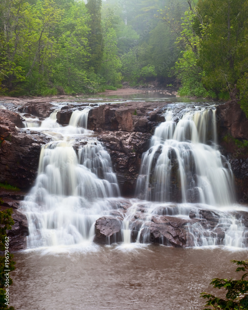Fototapeta premium Gooseberry Falls, waterfall on Gooseberry River by the North Shore of Lake Superior, Minnesota