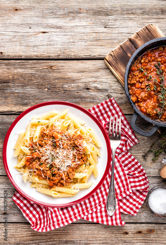 Pasta bolognese. Macaroni served with a classic italian bolognese stew sprinkled with Parmesan cheese photo