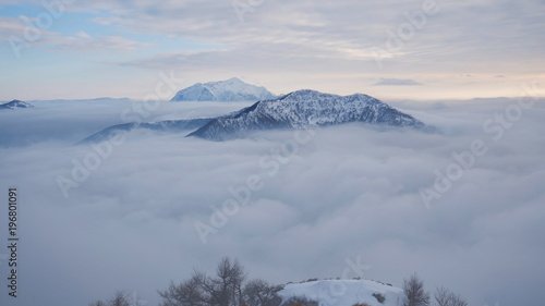 Clouds on  Mount Grigna and Lake Como from mount Legnoncino, Introzzo, Valvarrone, Lecco province, Lombardy, Italy, Europe.