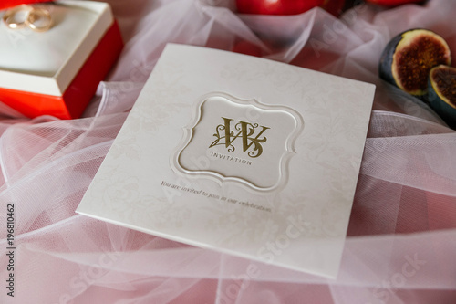 wedding invitation card with gold letters. closeup