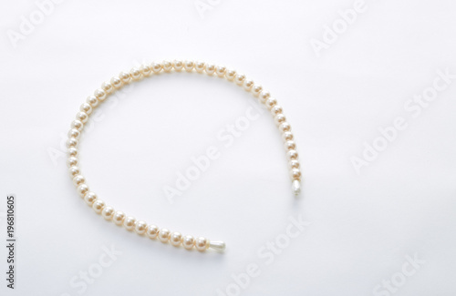 pearl hair band on white background