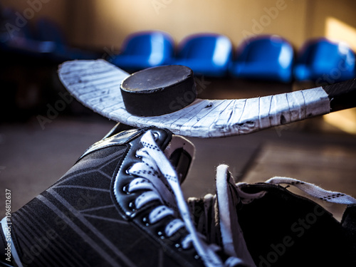 Photography close up person dresing ice hockey wear in locker room