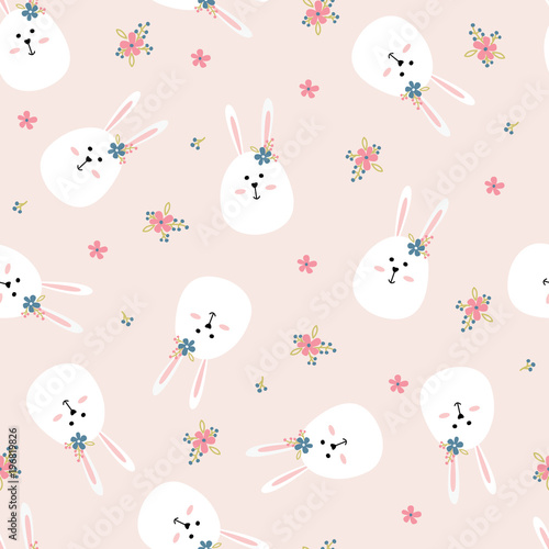 Easter seamless pattern with cute rabbits and flowers