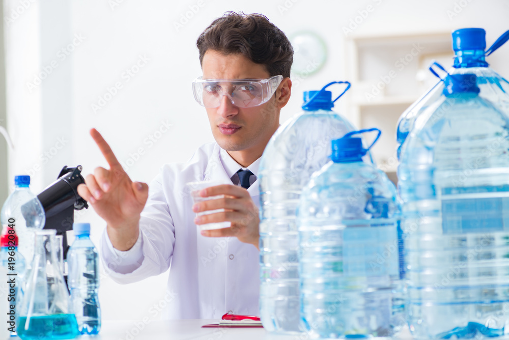 Fototapeta premium Lab assistant testing water quality