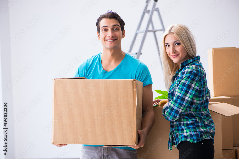 Young family moving in to new apartment Young family moving in to new apartment