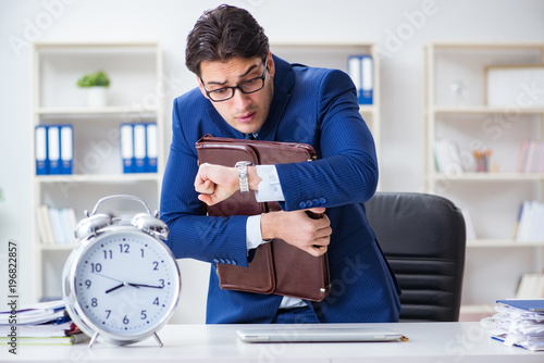 Businessman in bad time management concept