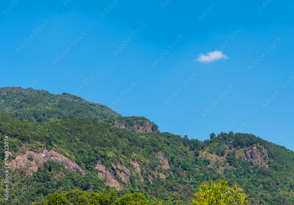 mountain and blue sky in background