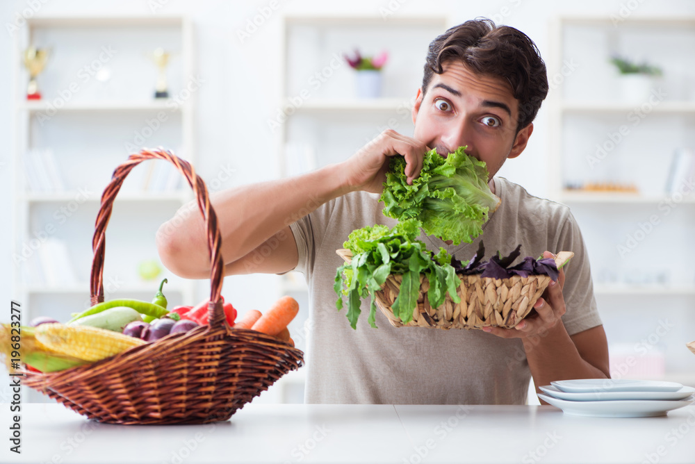 Young man in healthy eating and dieting concept Young man in healthy eating and dieting concept