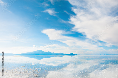 Mirror surface on the salt flat Salar de Uyuni, Altiplano, Bolivia © smallredgirl